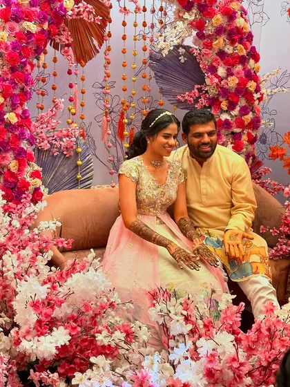 A lovely couple portrait from a mehndi ceremony, capturing the joy of the occasion.