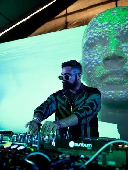 Another angle of the Absolut stage at Sunburn, with green-toned visuals creating a different mood.