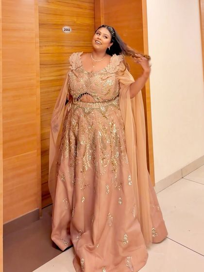 A candid moment of joy in the peach plus-size gown. It's moments like these that make my work so rewarding.