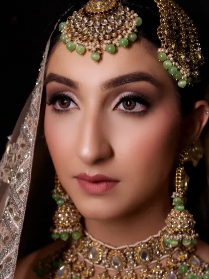 Another angle of this beautiful modern bride. The focus was on creating a flawless base and enhancing her features with soft, blended tones.