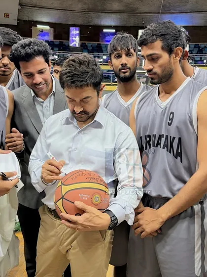 Aamir Khan signing a basketball for one of our players on set. These are the moments that our athletes will cherish forever, bridging the gap between their heroes and their own dreams.
