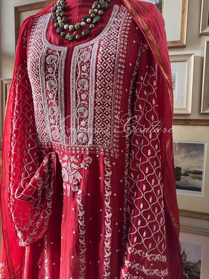 A straight-on view of the mannequin, providing a clear look at the symmetrical design of the yoke and sleeves.