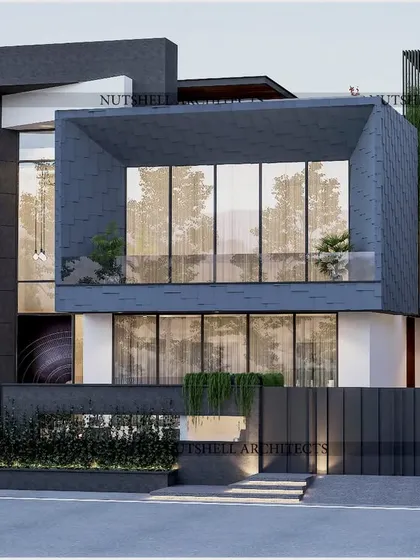 A frontal view of 'The Altair' project, showing how we use deep frames and cantilevered balconies to create depth and shadow. The design integrates green spaces with a cascading plant wall, softening the modern structure and connecting it to nature.