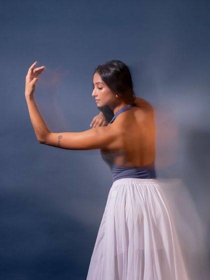 Another motion-blur image showing the fluidity of a dance phrase. These artistic photos are perfect for clients looking for unique, movement-based visual content.