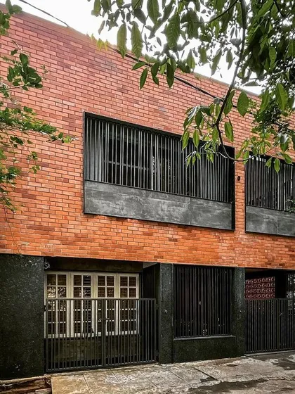 The completed renovation of a residence in JP Nagar. We transformed the original structure with an industrial-style design, featuring a bold exposed brick facade and custom metalwork to give the home a modern and robust character.