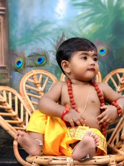 Another angle of our little Muruga, showing his adorable pose and the intricate details of the traditional dhoti and rudraksha beads.
