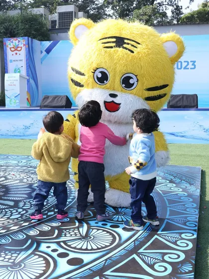 Nothing brings more joy to a kid's party than a live cartoon character. See how our friendly tiger mascot creates a magical moment, interacting gently with the youngest guests and making for perfect photo opportunities.