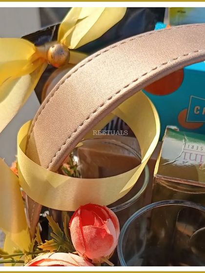 Detail of the handle and ribbon on the classic anniversary basket, showing the elegant construction.