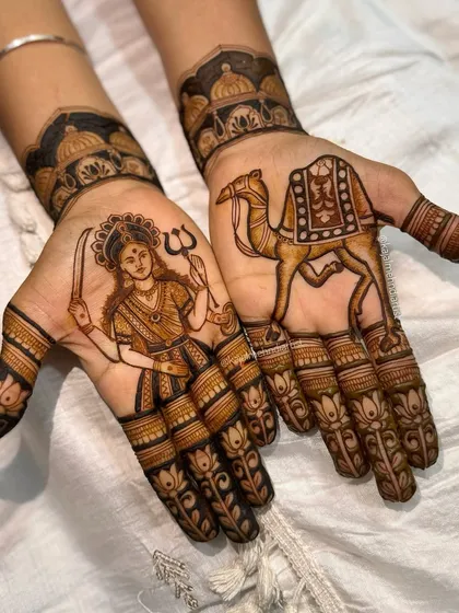 Bringing divine blessings to your special day. This design features a portrait of the goddess Dashama on one hand and her sacred camel on the other, a truly spiritual and personal request.