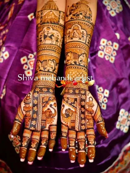 A traditional design featuring a bride in a doli on one palm and a groom on the other, with the forearms showing a procession of elephants and camels.