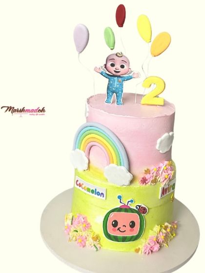 This two-tiered Cocomelon cake features two different flavours: the top is chocolate and peanut butter, and the bottom is a refreshing mango Chantilly. All the colourful toppers are made from scratch and are fully edible.