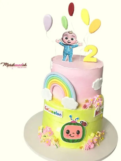 This two-tiered Cocomelon cake features two different flavours: the top is chocolate and peanut butter, and the bottom is a refreshing mango Chantilly. All the colourful toppers are made from scratch and are fully edible.