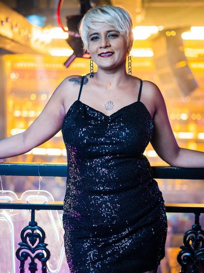 A guest posing on the balcony.