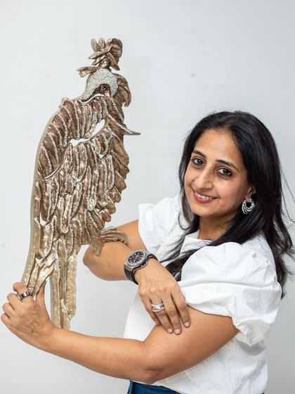 A portrait with "The Bronze Guardian." The hawk's form is both elegant and formidable, reflecting a spirit of leadership.