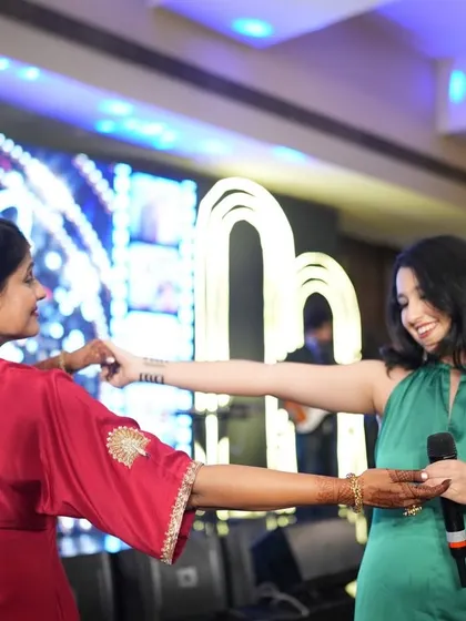 Sharing a dance with a guest in Hyderabad. We're not just on stage, we're part of the celebration, making sure everyone feels included in the fun.