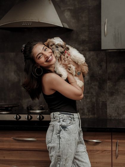 A heartwarming lifestyle shot with a furry friend. Capturing these genuine moments of joy and connection is a special part of my work.
