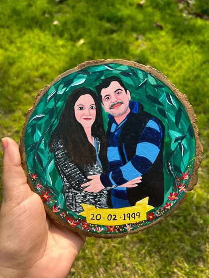 Holding the finished piece to show its size and the handcrafted quality. Each portrait is a labor of love, designed to be a special gift for your loved ones.