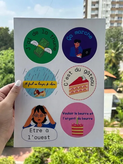 Language is culture, and we make it fun. This sheet of stickers with common French idioms is an example of our custom designed learning materials that help immerse students in the language in a creative and memorable way.
