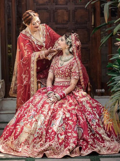 A mother helping her daughter get ready. It's a full-circle moment, and the makeup has to be perfect for it.