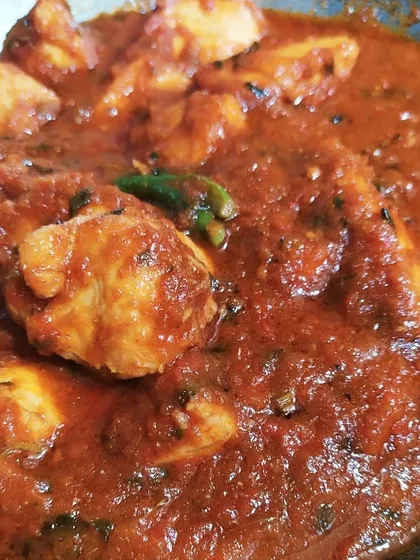 My Laal Murgi is a fiery red chicken that isn't too spicy. The color might be concerning, but as my mother-in-law discovered, the taste is just right.