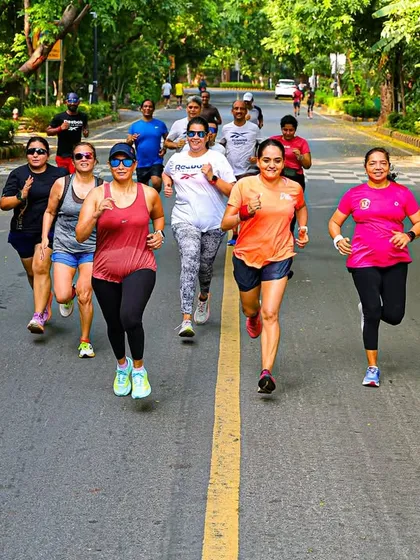 This is the energy of our running squad. We are a community of all ages and fitness levels, pushing each other to get stronger with every step. We train outdoors, embracing the elements and the joy of movement together.