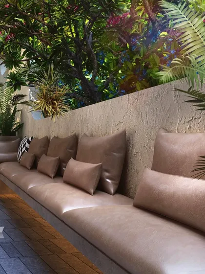 An outdoor seating area within the Evara township. The design focuses on creating comfortable, beautifully landscaped common areas for residents to enjoy.