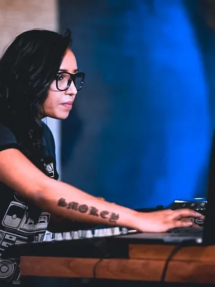Playing for Basscamp at Khar Social. You can see my focus as I use Ableton to mix tracks. I teach the importance of concentration and technical precision during a live performance.