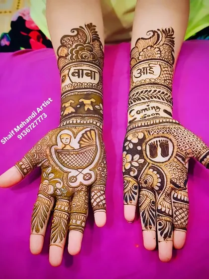 Another perspective of the baby shower mehandi, showing the detailed line work and shading that brings the baby and cradle illustrations to life.