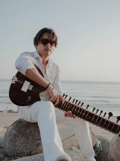 Another teaser shot from the beach, capturing a cool, relaxed vibe.