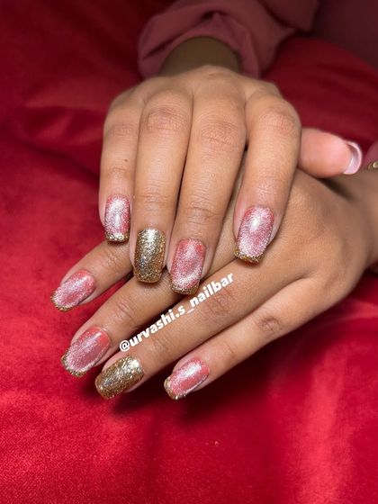 This collection showcases various cat-eye designs, from pink and gold glitter combinations to subtle shimmers with gold chrome tips. It highlights the versatility and enchanting effect of magnetic polishes.