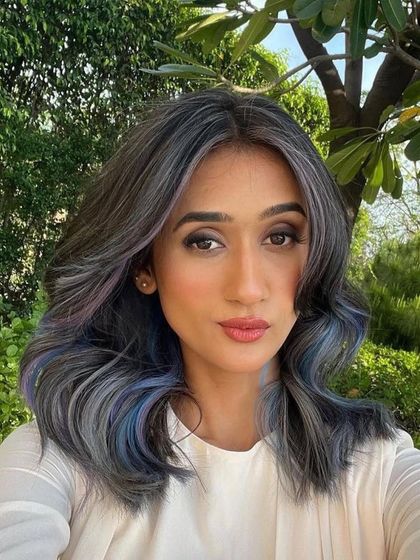 A beautiful, complex blend of ash, lilac, and blue tones. This is a sophisticated way to wear creative colors.