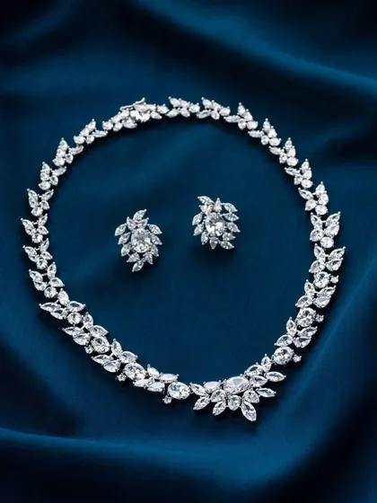 Another favorite for a favorite client. This diamond leaf necklace for Ranka Jewellers is laid out on a rich blue satin, which makes the white diamonds appear even brighter and more brilliant.