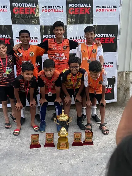 Our U11 team celebrating their runner-up finish at the Independence Cup tournament.