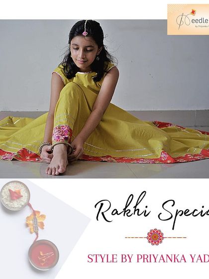 A seated pose showing the beautiful drape of the yellow cotton lehenga. The outfit is designed to be comfortable and stylish, whether standing, sitting, or celebrating.