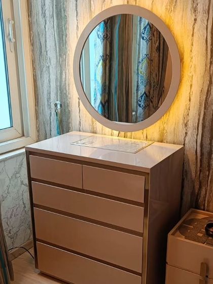 A closer view of the bespoke dresser, highlighting the smooth finish and the quality of the materials. Every detail is impeccably crafted.