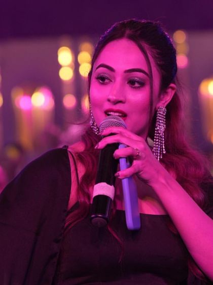 A close-up shot of me, fully in the zone, speaking to the audience. This is where I feel most alive and connected.