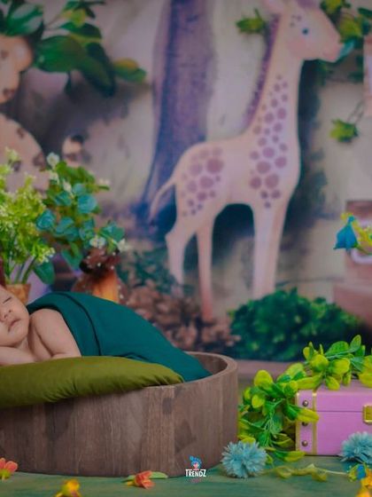 A wide shot of the jungle theme, showing the 'Welcome to the Jungle' sign and various animal props creating a fun scene.