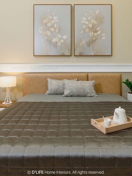 A serene bedroom designed for rest and relaxation. The tan leather headboard is complemented by soft, neutral bedding and elegant wall art, creating a calm and inviting retreat.