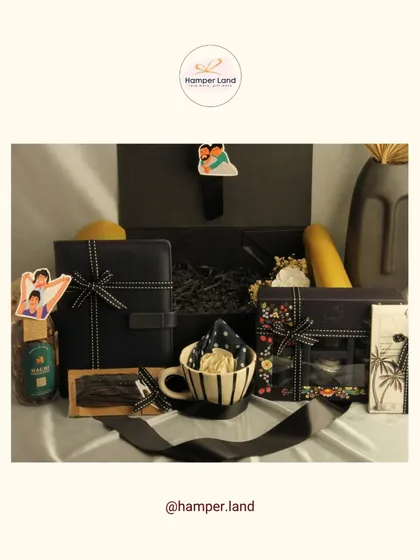 A personalized Father's Day hamper featuring custom photo tags. This gift includes a notebook, a striped mug, and other curated items, making it a truly personal and thoughtful present.