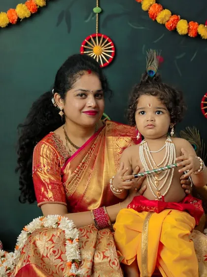 A beautiful Janmashtami themed photoshoot celebrating culture and tradition. We provide creative setups like this Krishna theme, complete with costumes and props, to make your child's photoshoot unique and memorable.