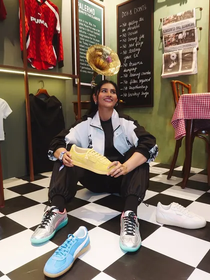 Looking up at a gramophone, this photo from the Puma booth blends a vintage aesthetic with modern streetwear.