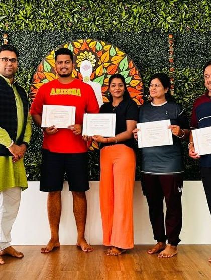 Celebrating the completion of a rejuvenating yoga and meditation retreat. We congratulate our participants as they receive their certificates, marking a new step on their wellness journey.