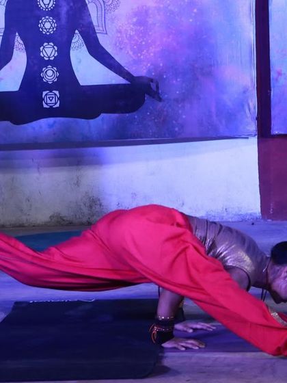 "Yoga is 99% practice & 1% theory." A challenging arm balance, Eka Pada Koundinyasana II, performed during an event.