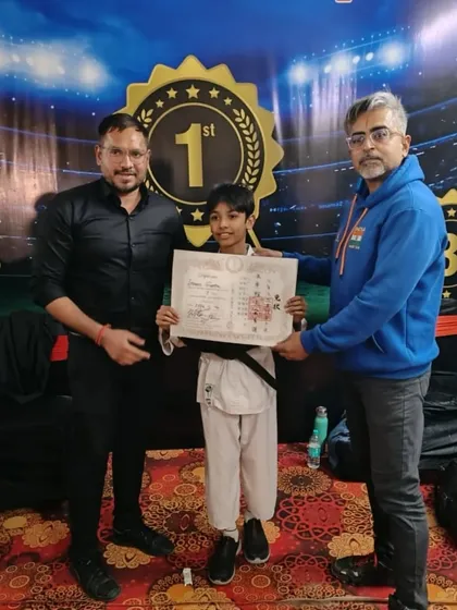 A proud moment as our young student, Ishaan, is awarded his Black Belt. This achievement is the result of years of dedication, hard work, and commitment to the art of Karate.
