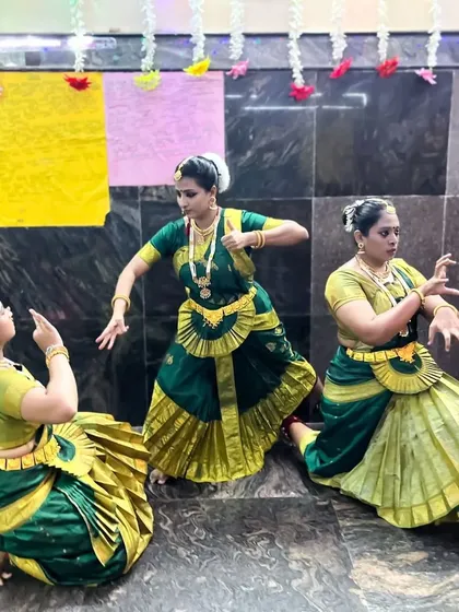 Another group of my students performing with devotion at the temple.