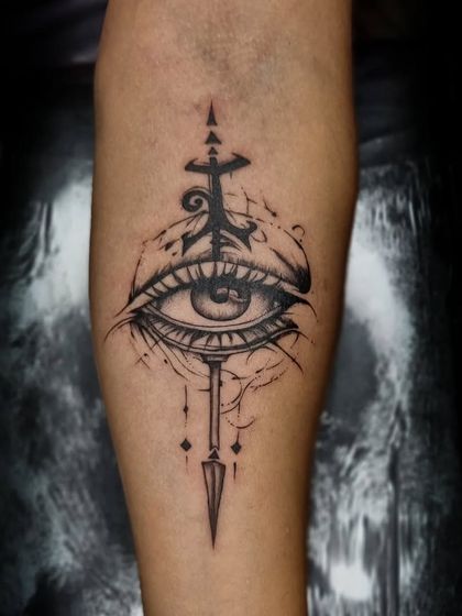 The Eye of Providence, a symbol of divine guidance. I used a sketch style with an arrow motif to give this classic symbol a modern and personalized feel.