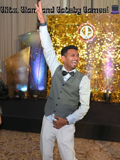 A guest enjoying the dance floor in front of the glittering Gatsby stage. The ultimate goal is to create an event so engaging that everyone feels the energy.