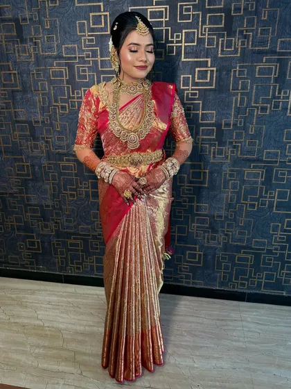 A full-length portrait of the bride, looking regal and elegant.