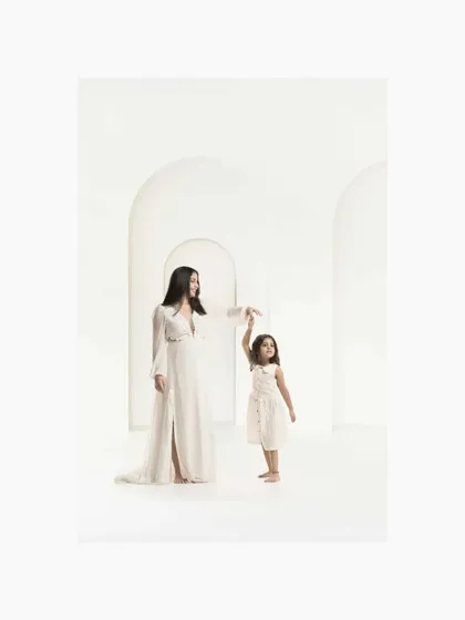 The story continues. This minimalist studio portrait of a mother and her young daughter is about the beautiful bond that lasts a lifetime. It’s a gentle reminder that these photos are not just for you, but a legacy for your children to cherish.