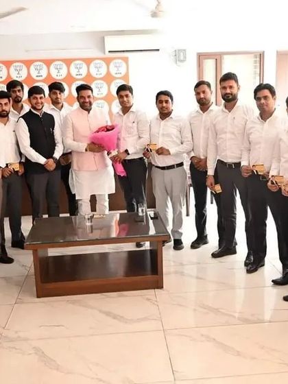 Presenting a bouquet to Shri Manish Yadav during our meeting. It's important to maintain a positive and constructive dialogue with our political leaders.